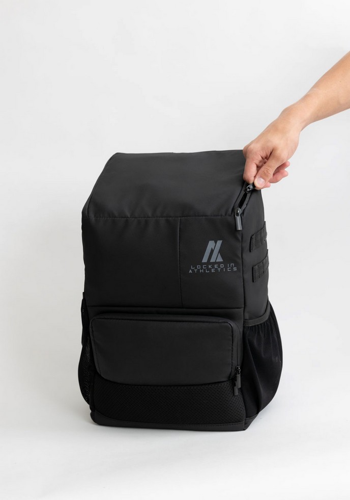 Version 1.0 prototype Locked In Athletics backpack held by hand